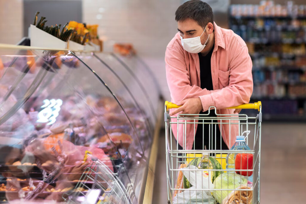 front-view-man-shopping-with-cart